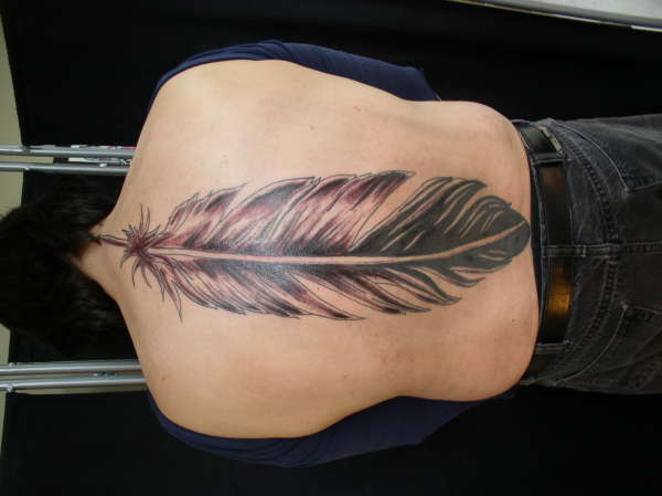 huge feather tattoo