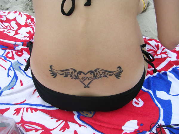 Tribal angel wings tattoo