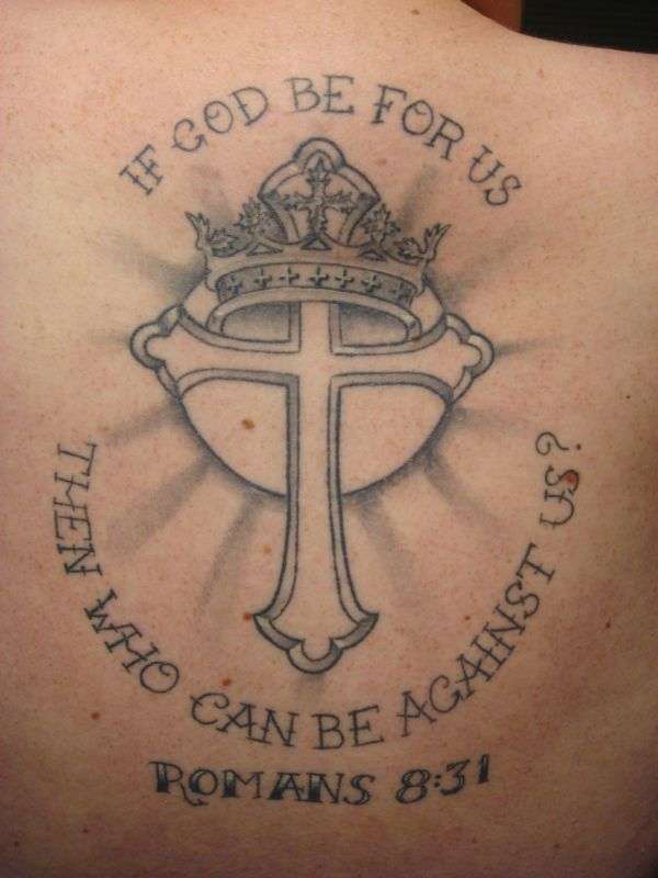 Back cross tattoo