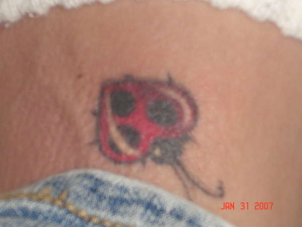 Lady bug tattoo