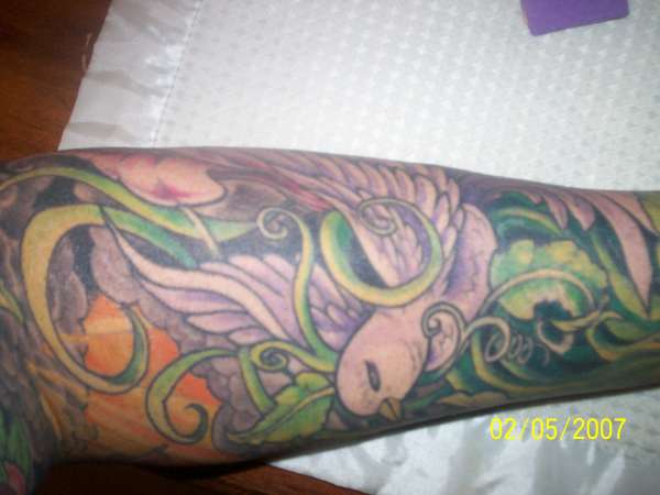 bottom half sleeve tattoo