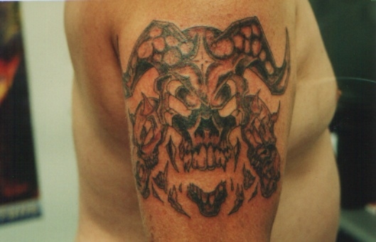 Skull Face tattoo