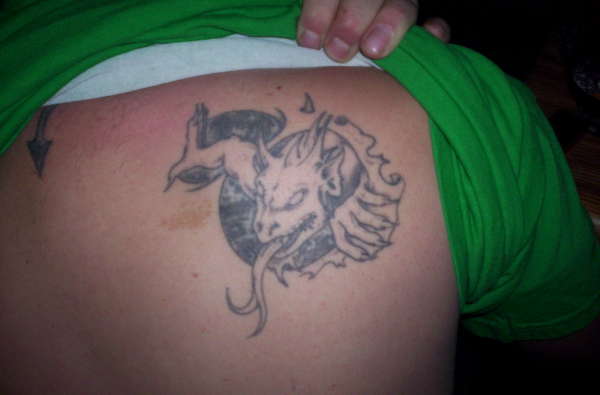 Dragon Crawling Out tattoo