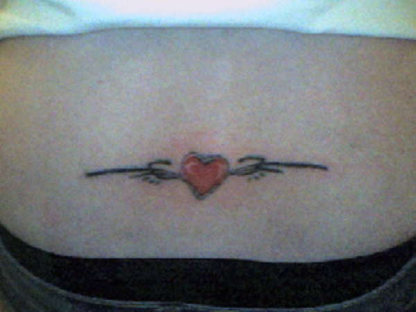 heart and tribal tattoo