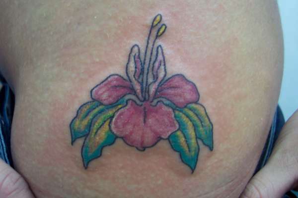 flower on hip tattoo