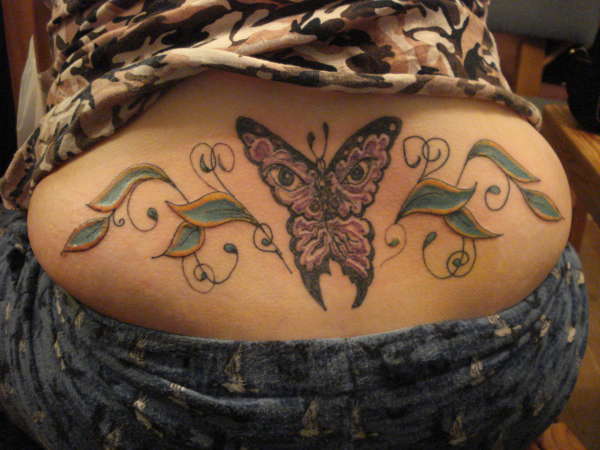 butterfly colored tattoo