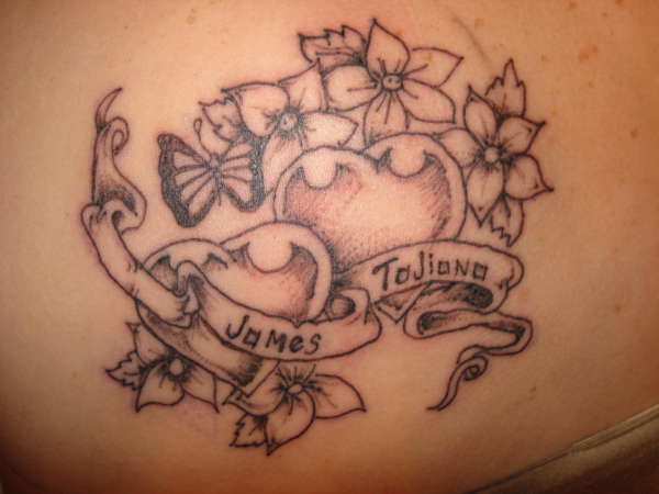 hearts on shoulders tattoo
