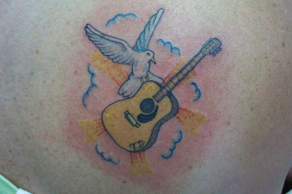 on the wings of a snow white dove tattoo