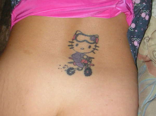 Hello Kitty Motocrosser tattoo