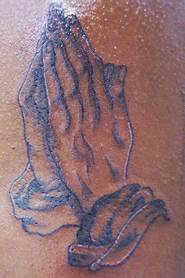 praying hands tattoo