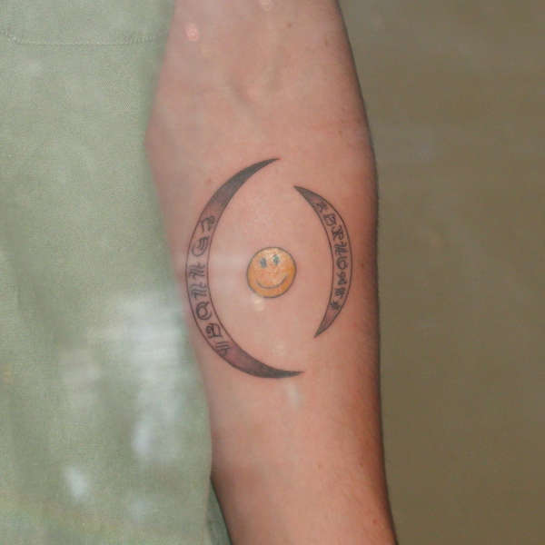 APC smiley tattoo