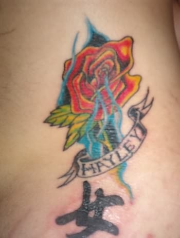 Tat with my daughters name in it tattoo