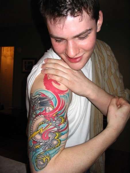 nearly complete sleeve tattoo