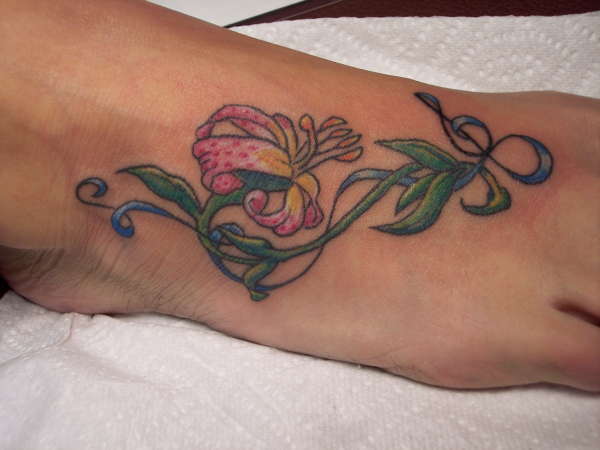 Foot tat id did tattoo