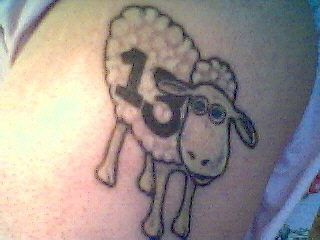 Serta Lamb tattoo