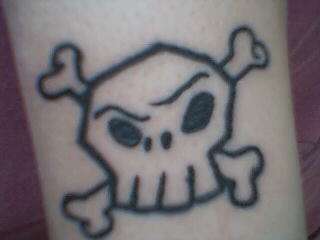 Cute Skull and Crossbones tattoo
