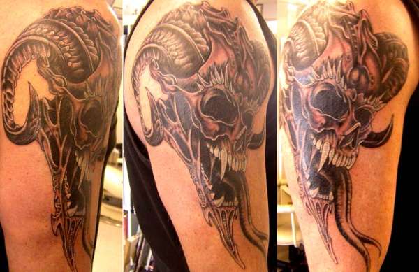 Skulliosis tattoo