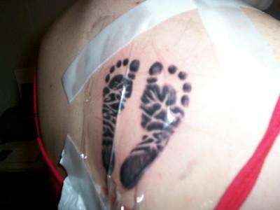 footprints tattoo