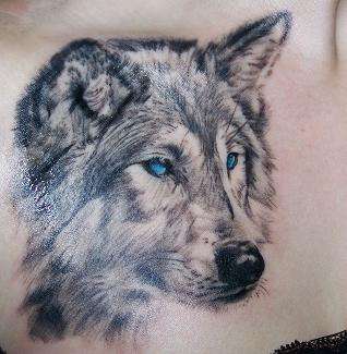 Wolf with blue eyes tattoo
