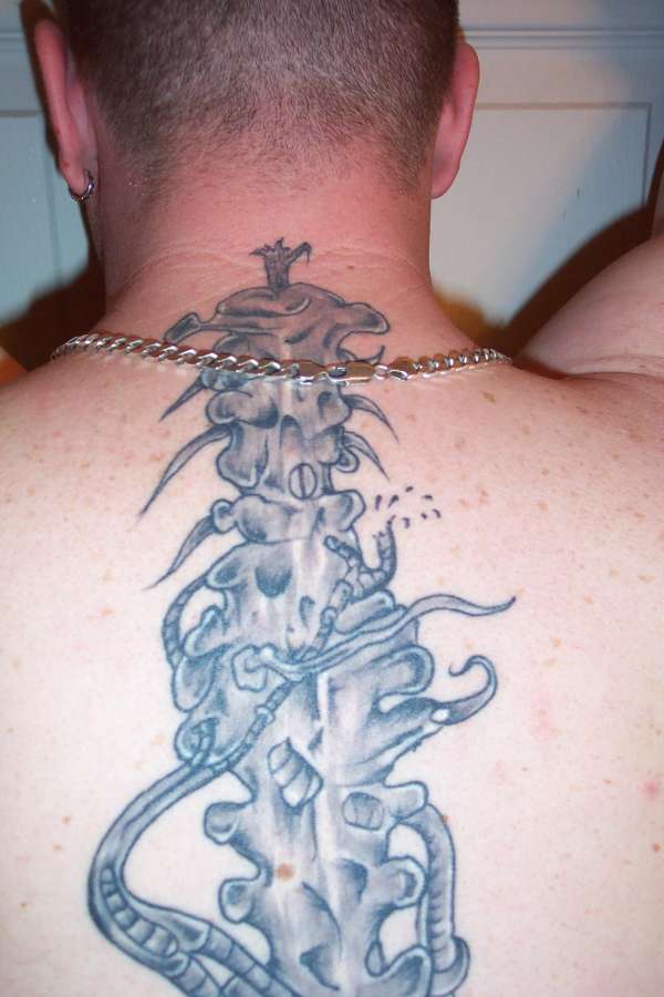 Bio mechanical spine tattoo
