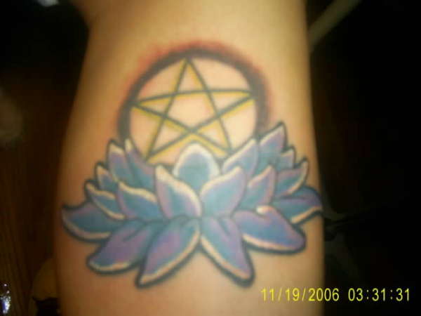 Pentagram w/ lotus tattoo