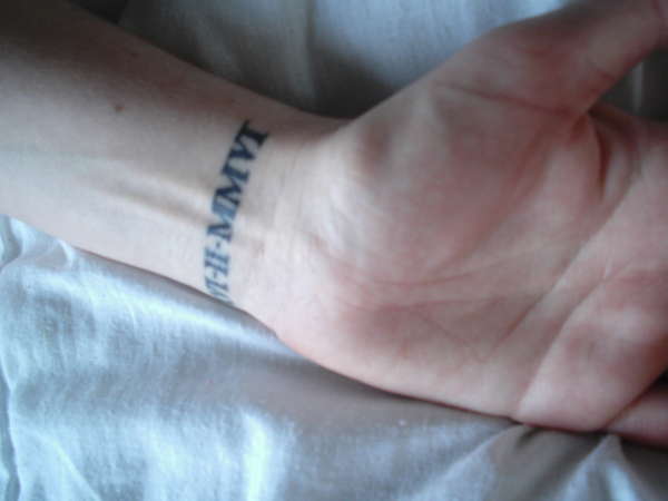roman numerals tattoo wrist
