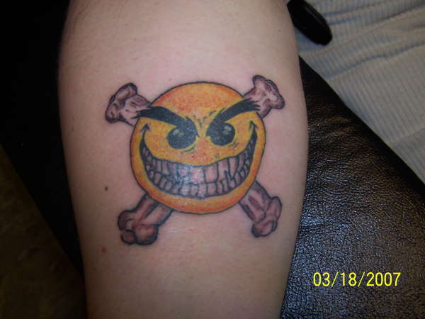 Mean Happy Face tattoo