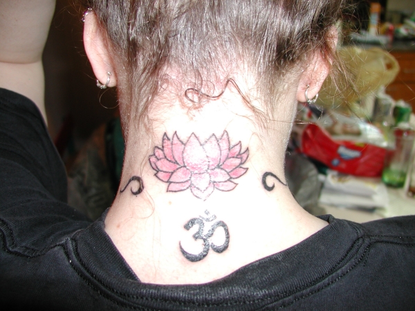 lotus and om tattoo