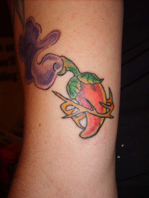 sacred papper tattoo