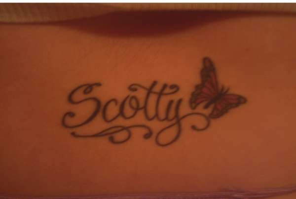 Husband's name with butterfly tattoo