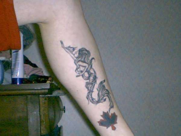 mermaid on left leg tattoo