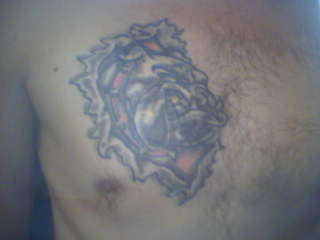 bulldog coverup chest tattoo