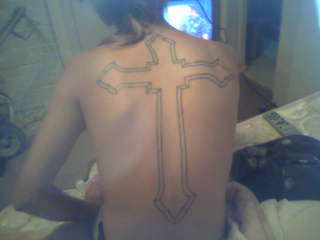 cross on back tattoo