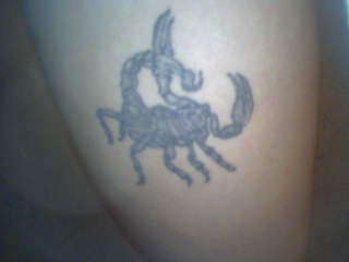 scorpion right leg tattoo