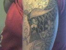 1st sittin on koi tattoo