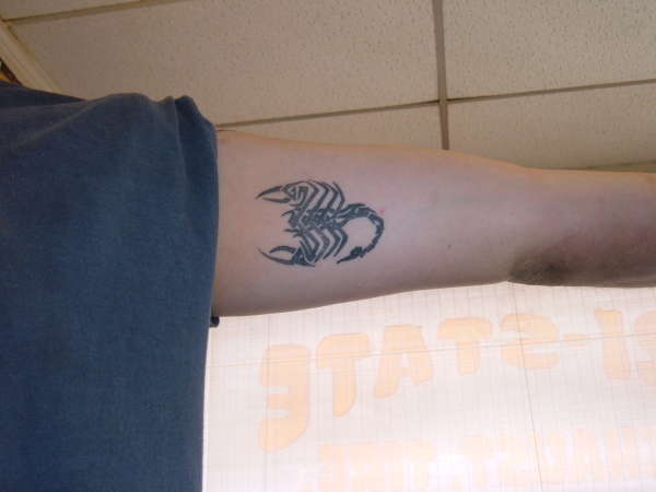 scorpian underarm tattoo