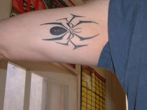 spider under arm tattoo