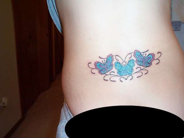 Her Butterfly (2nd pic) tattoo