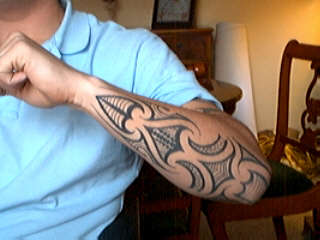 left forearm tattoo