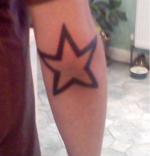star on my elbow tattoo