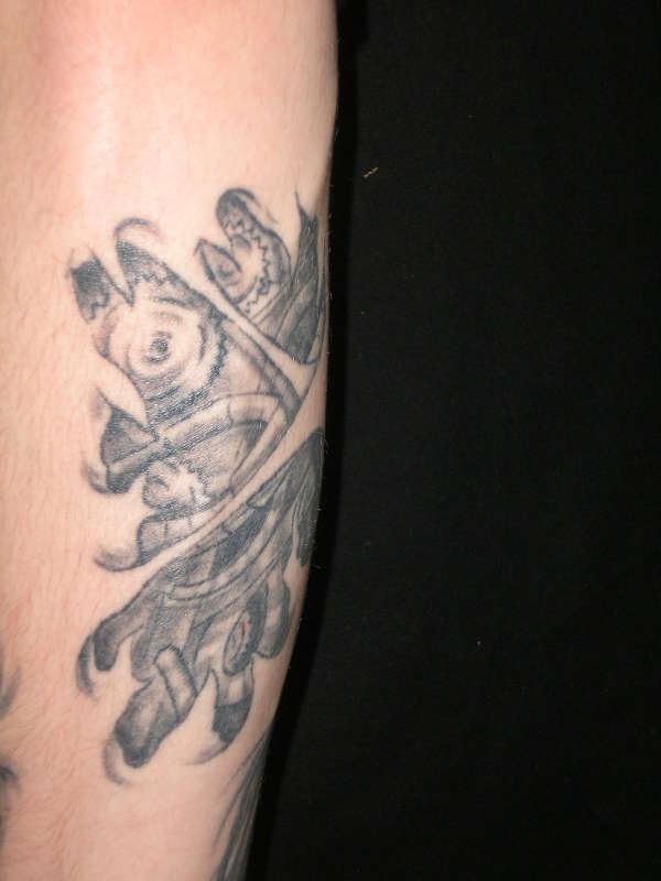 mechanical arm tattoo