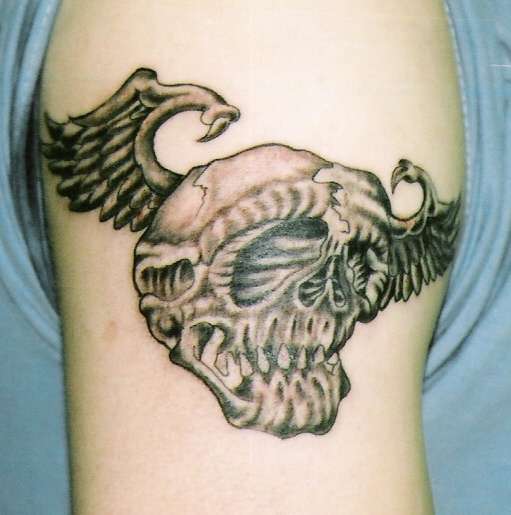 Skull & Wings tattoo