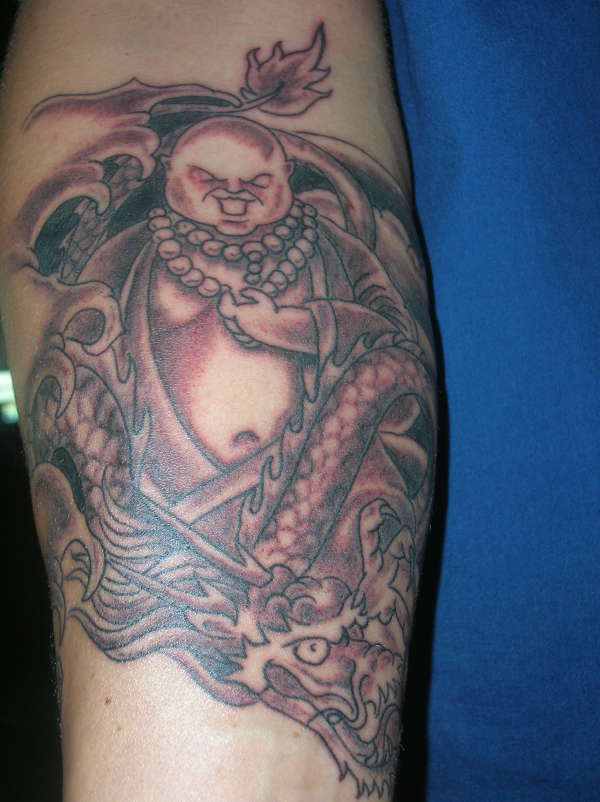 dragon with buddha tattoo