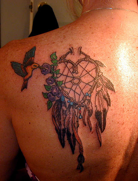dream catcher with baby cow tattoo