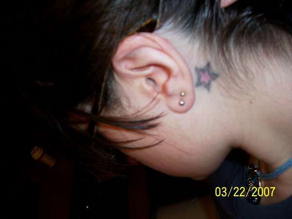 Ear Tat tattoo