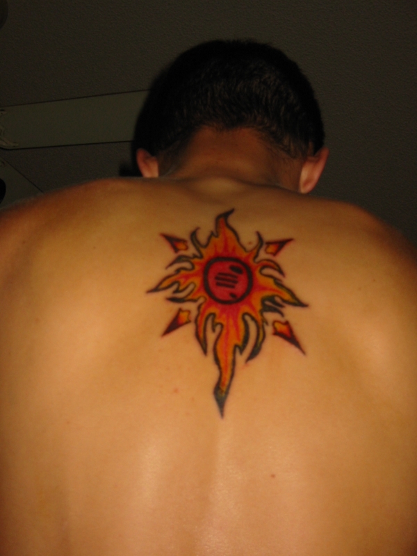 Tribal Sun tattoo