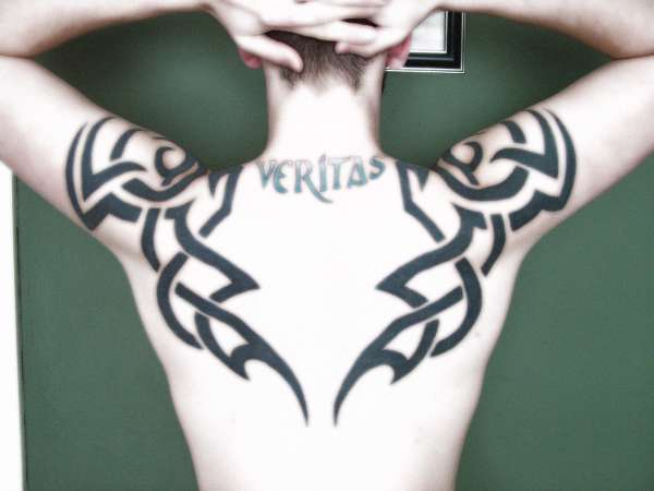 Tribal & Veritas (Truth in Latin) tattoo