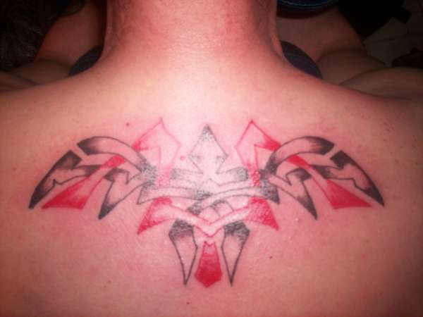 shoulder piece tattoo
