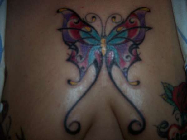 flutter-bye between tits tattoo