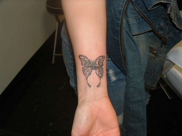 stone butterfly tattoo